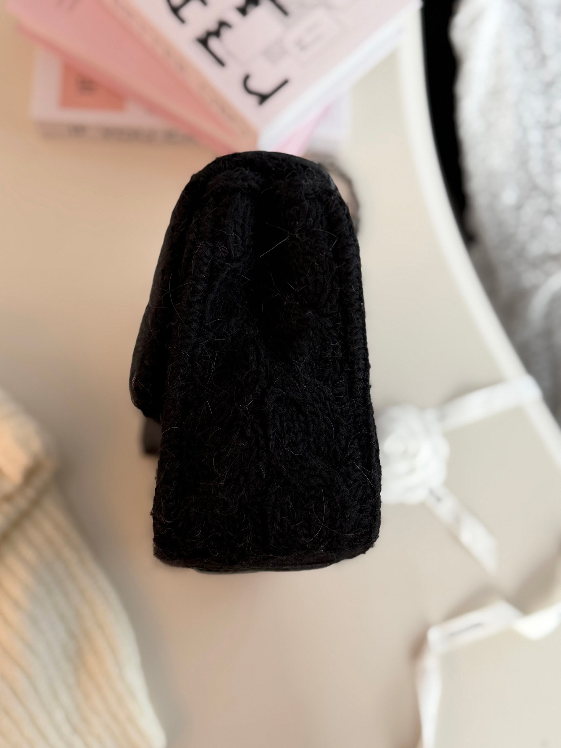 Chanel black knitted wool flap bag with vintage silver chain