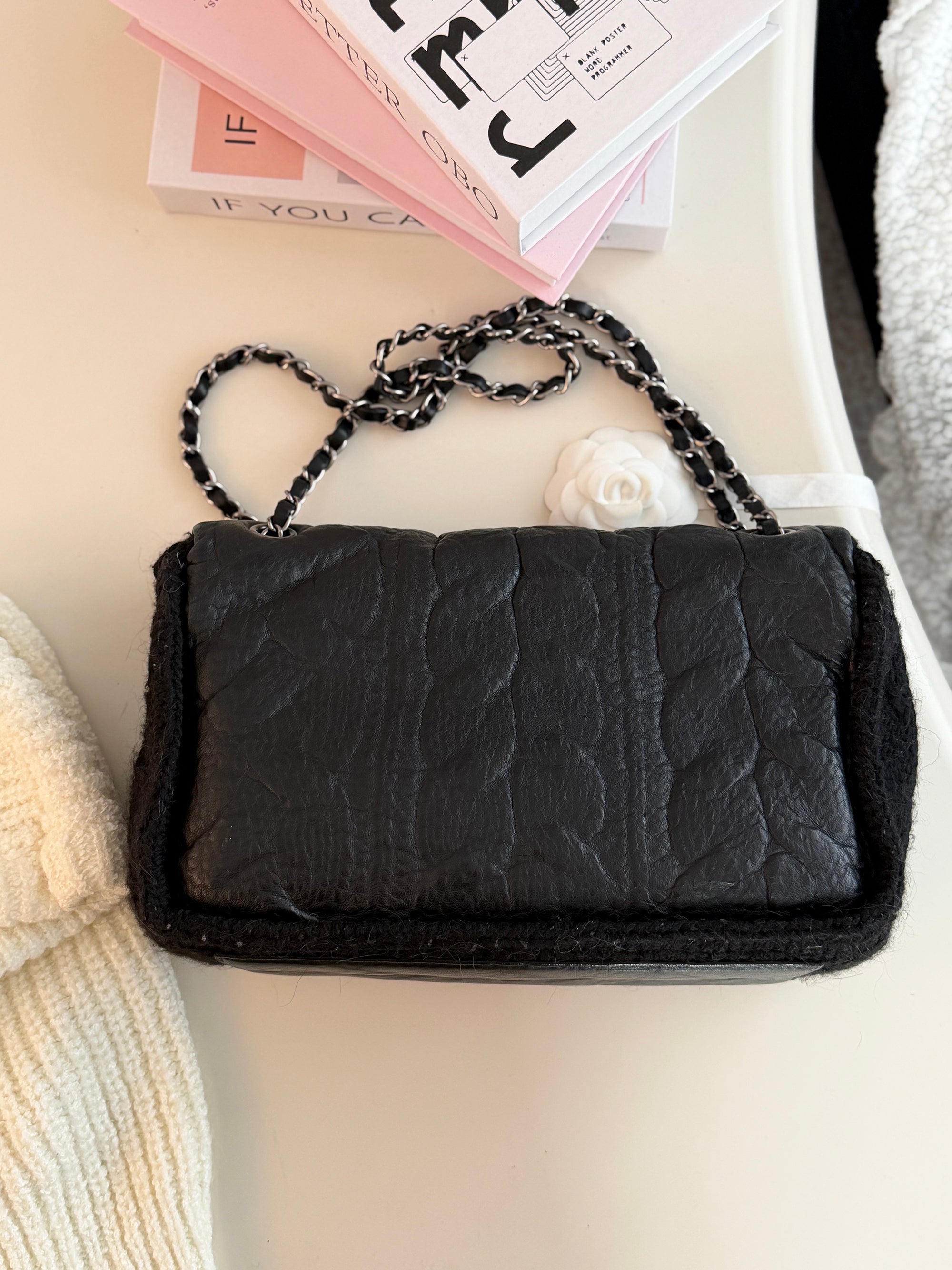 Chanel black knitted wool flap bag with vintage silver chain
