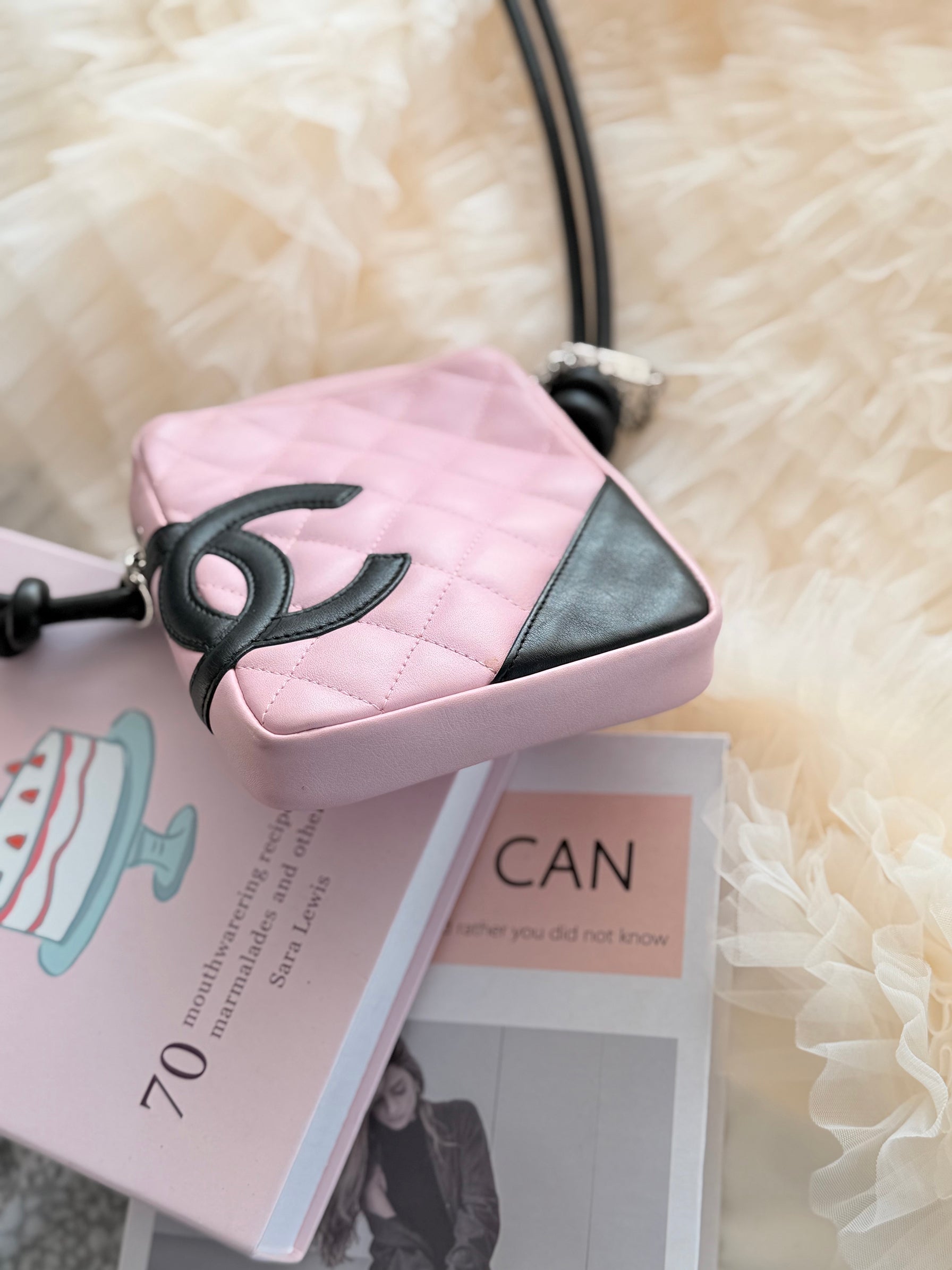 Chanel Pink Cambon Shoulder Bag can easily fit an iPhone Max