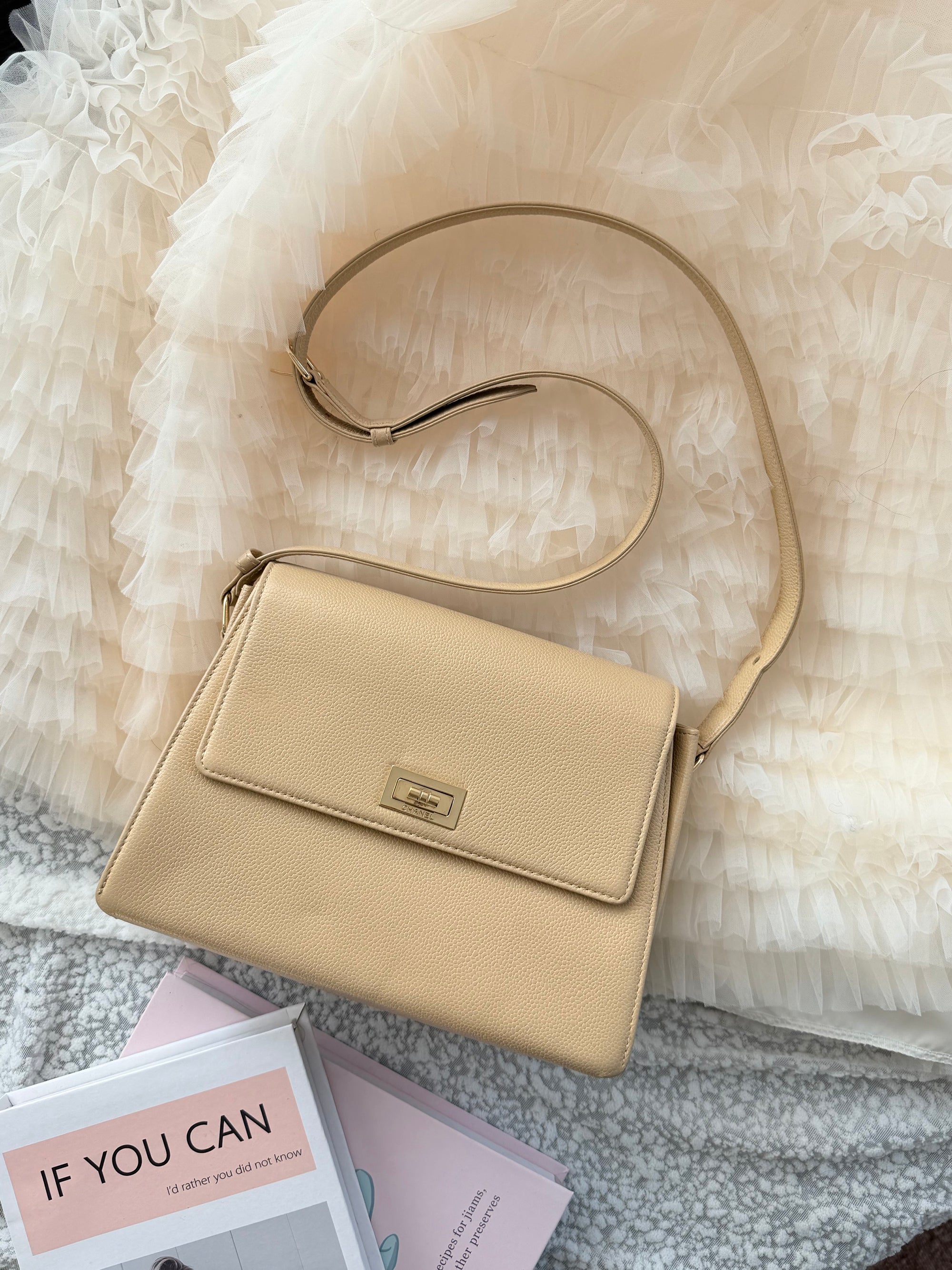 Chanel Vintage 2.55 Shoulder Bag with an adjustable shoulder strap length