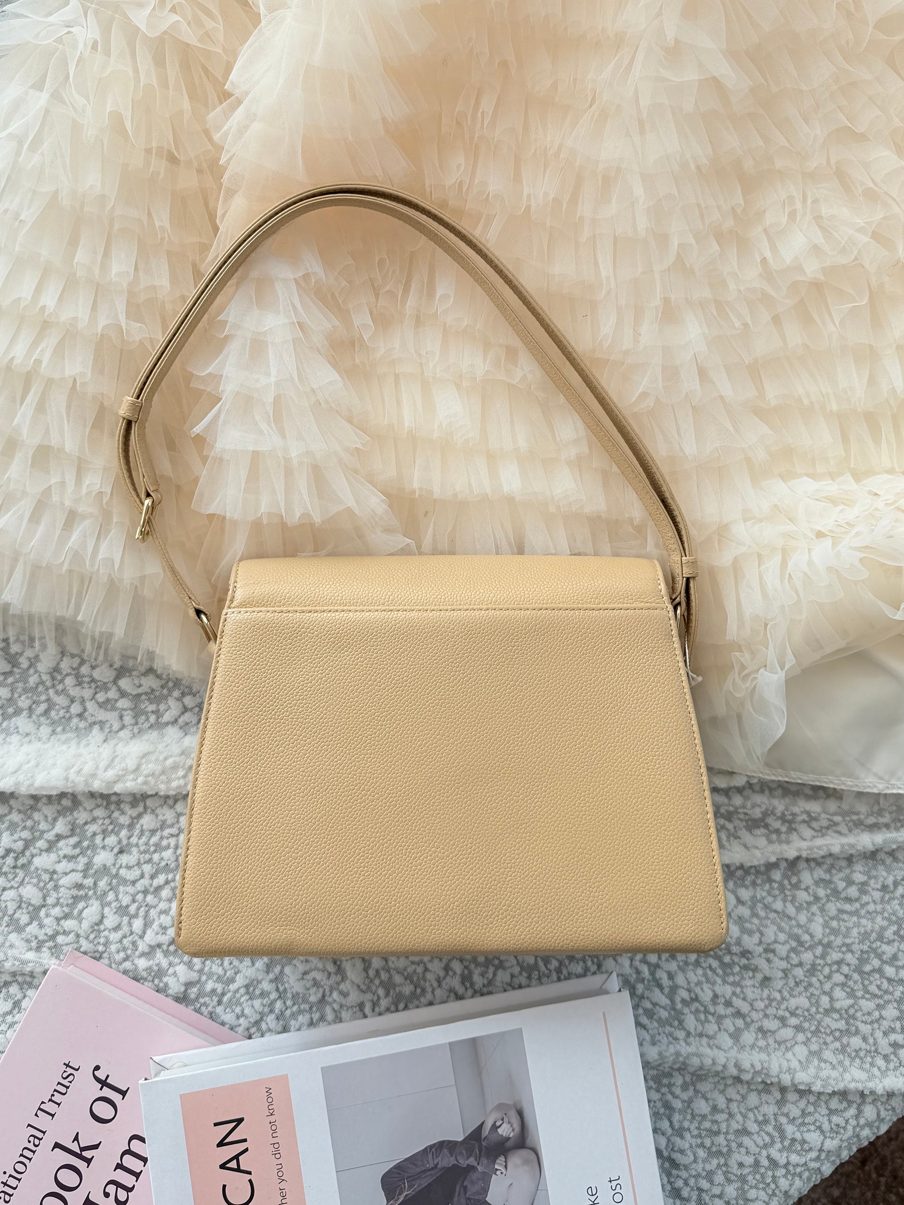 Chanel Vintage 2.55 Shoulder Bag with an adjustable shoulder strap length