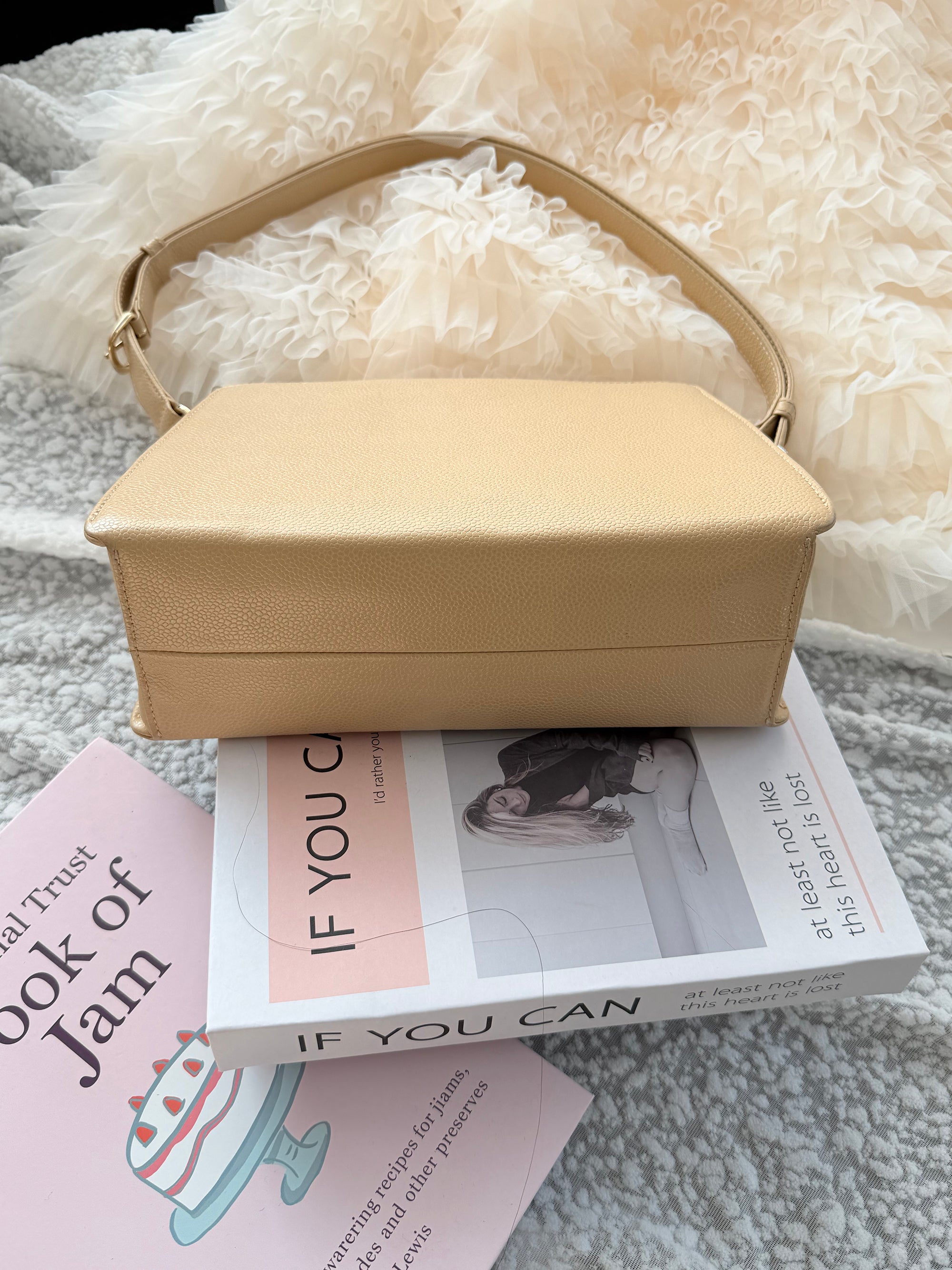 Chanel Vintage 2.55 Shoulder Bag with an adjustable shoulder strap length